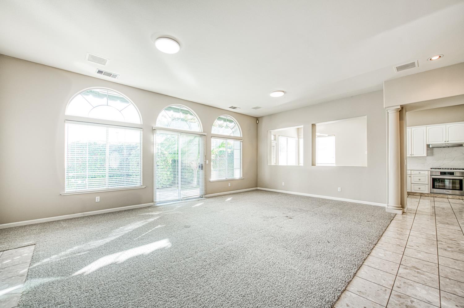 2140 West Rue St Michel Fresno, CA 93711 - Photo 11 of 36 a view of an empty room with a window