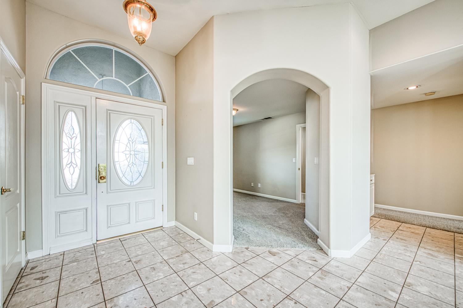 2140 West Rue St Michel Fresno, CA 93711 - Photo 12 of 36 an entryway view with windows