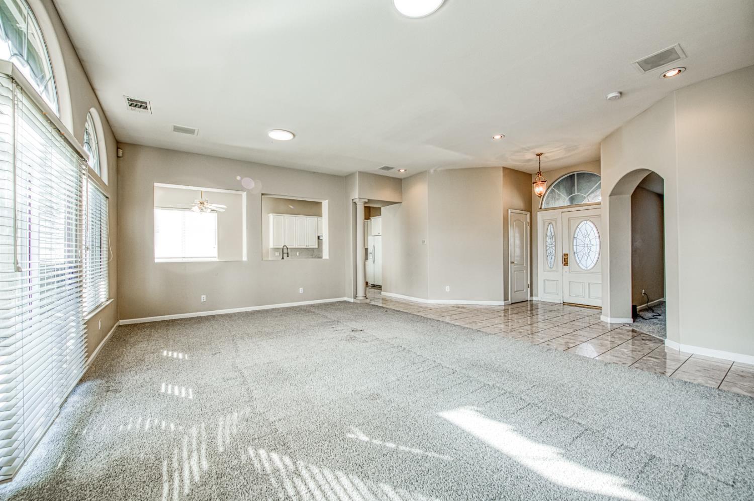 2140 West Rue St Michel Fresno, CA 93711 - Photo 15 of 36 a view of an empty room and window