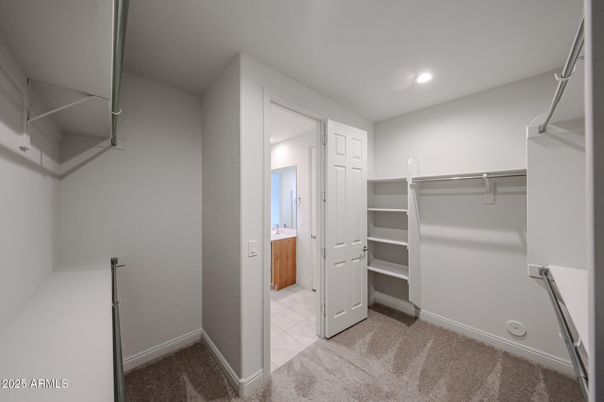 7072 West Oberlin Way Peoria, AZ 85383 - Photo 14 of 24 a view of an empty walk in closet