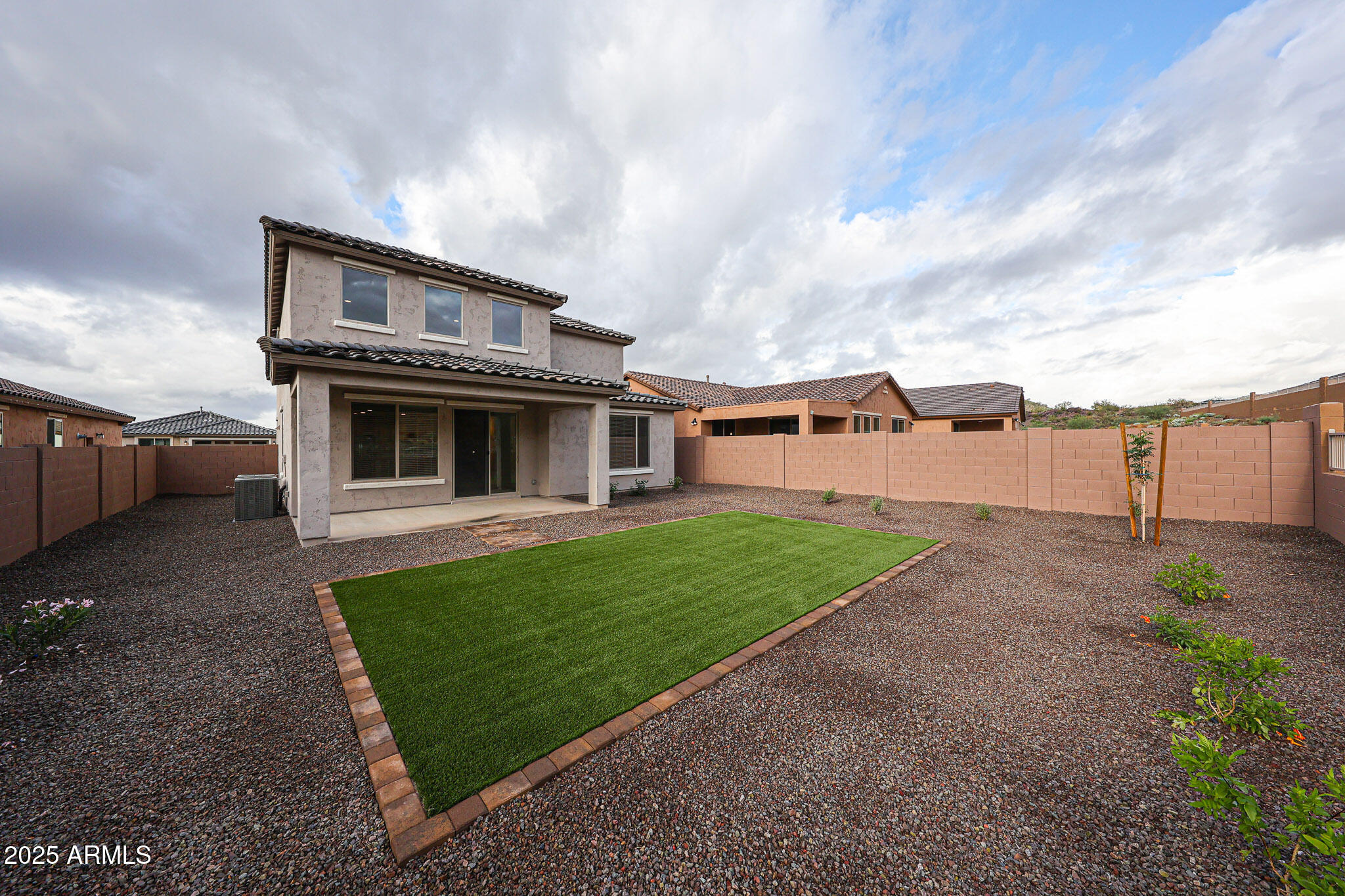 7072 West Oberlin Way Peoria, AZ 85383 - Photo 24 of 24 a view of a house with a yard