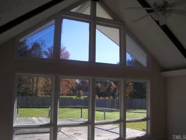 7190 Buffalo Road Selma, NC 27576 - Photo 2 of 6 Family room wall is all glass over looking private fenced rear yard