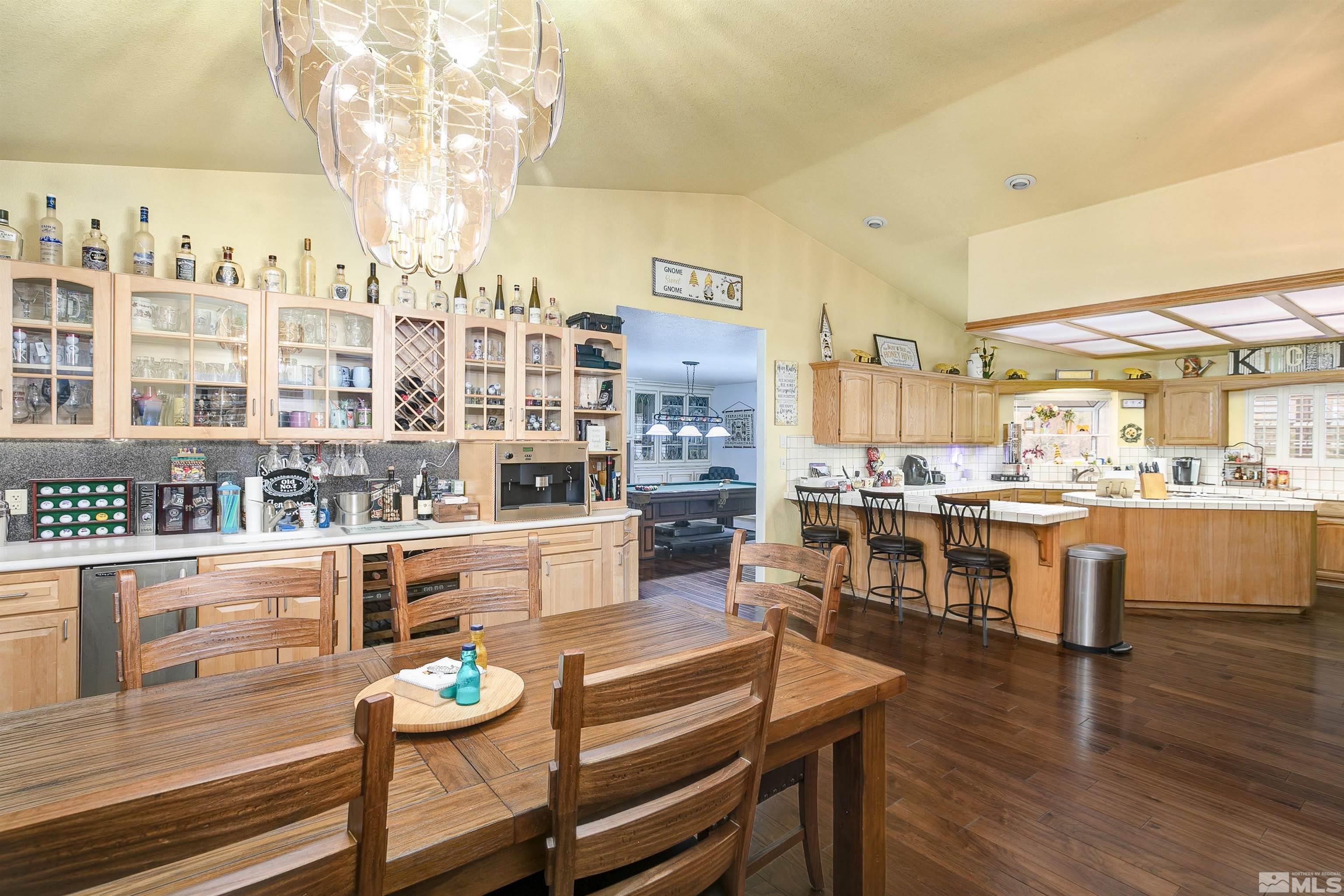 5650 Rivers Edge Drive Fallon, NV 89406 - Photo 11 of 35 a large kitchen with a table and chairs