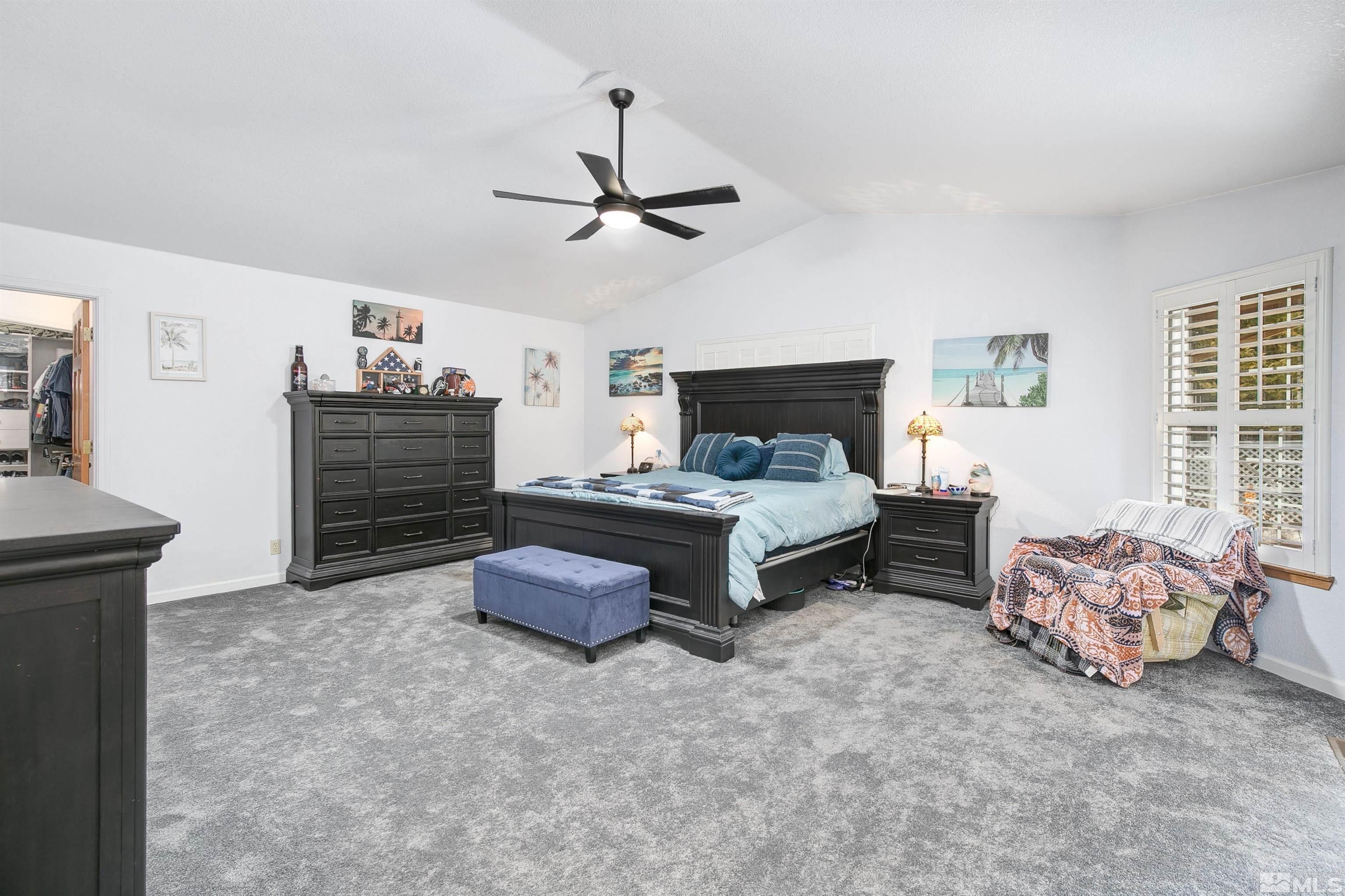 5650 Rivers Edge Drive Fallon, NV 89406 - Photo 19 of 35 a living room with furniture and a chandelier