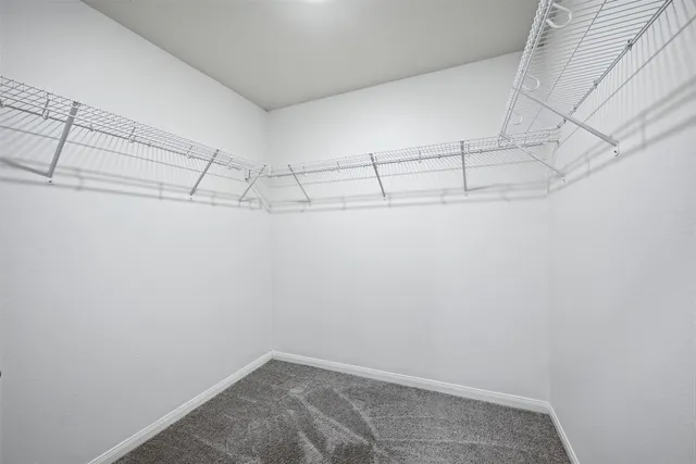 a view of a room with racks on the wall