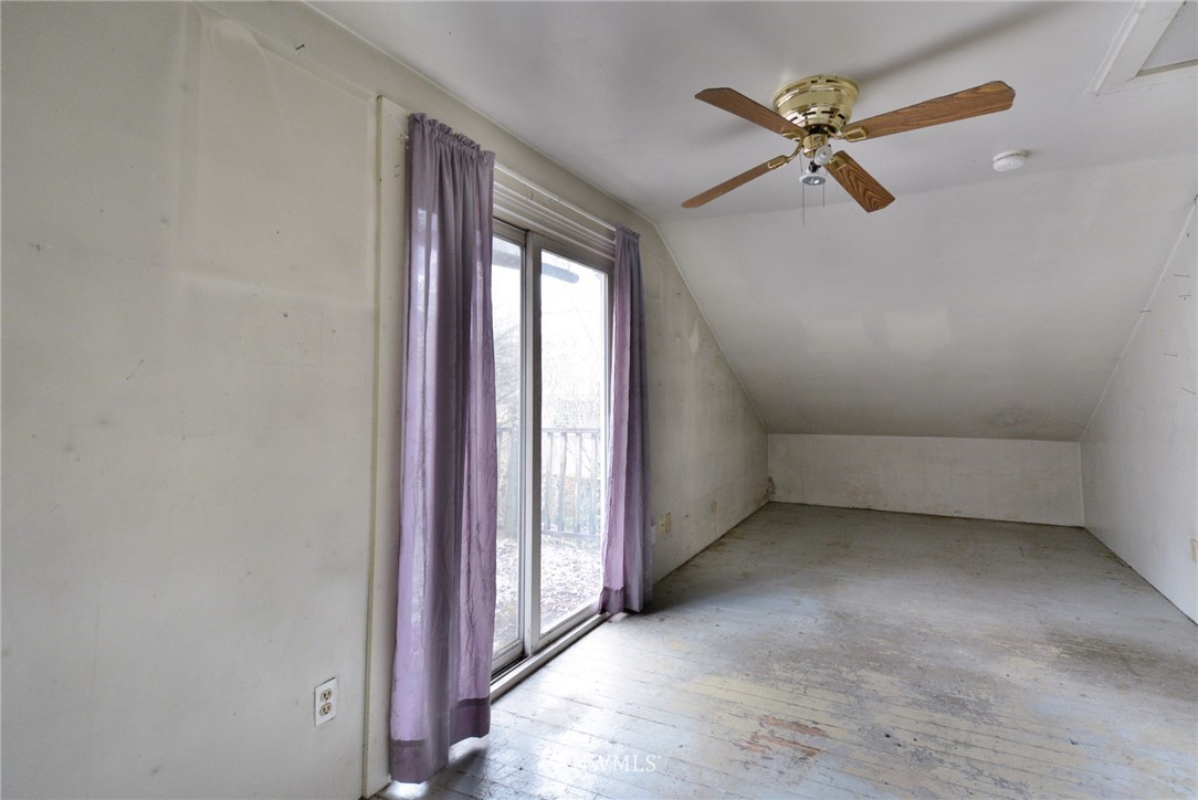 23004 Bothell Everett Highway Bothell, WA 98021 - Photo 8 of 23 an empty room with windows and fan
