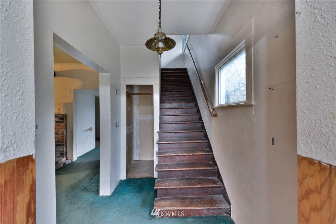 23004 Bothell Everett Highway Bothell, WA 98021 - Photo 10 of 23 a view of entryway and hall with wooden floor