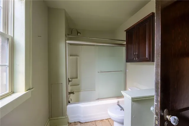 a bathroom with a sink and toilet