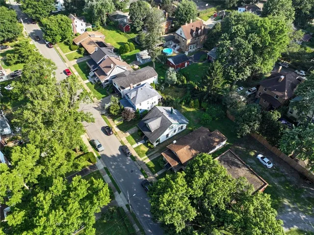 an aerial view of house with yard