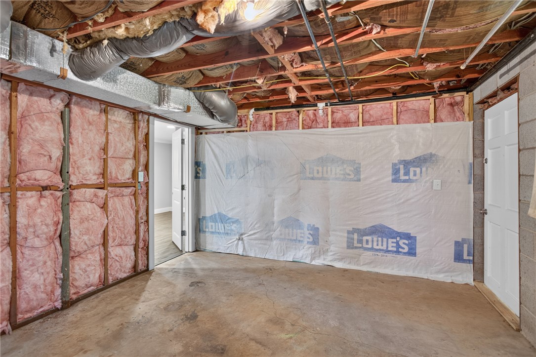 712 Beech Drive Seneca, SC 29678 - Photo 35 of 41 Unfinished basement space offers a blank canvas for future expansion.