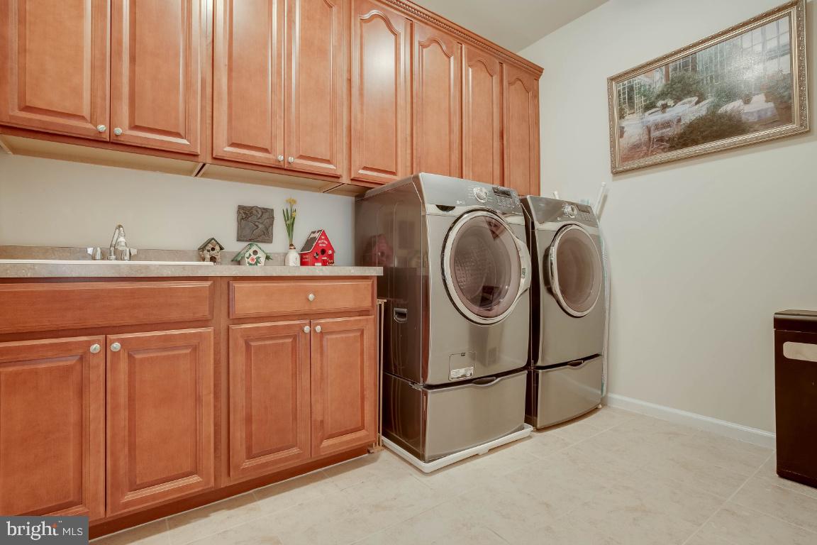 41985 Riding Mill Place Ashburn, VA 20148 - Photo 37 of 46 Upper Level Laundry Room