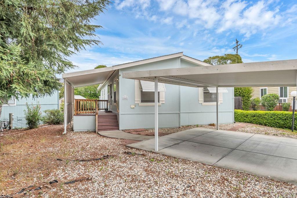 58 Cardinal Way, Unit 58 Santa Rosa, CA 95409 - Photo 1 of 1 a backyard of a house with lots of green space