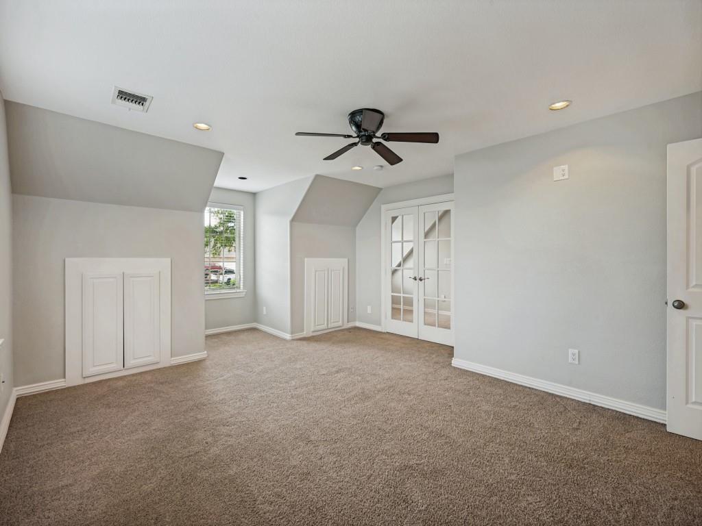 5975 Diamond Spur Frisco, TX 75036 - Photo 25 of 40 a view of a livingroom with a ceiling fan