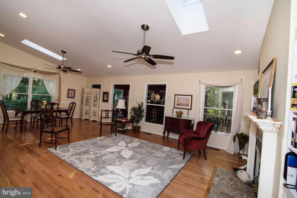 17 Mist Flower Road Ocean Pines, MD 21811 - Photo 16 of 49 a living room with furniture and wooden floor