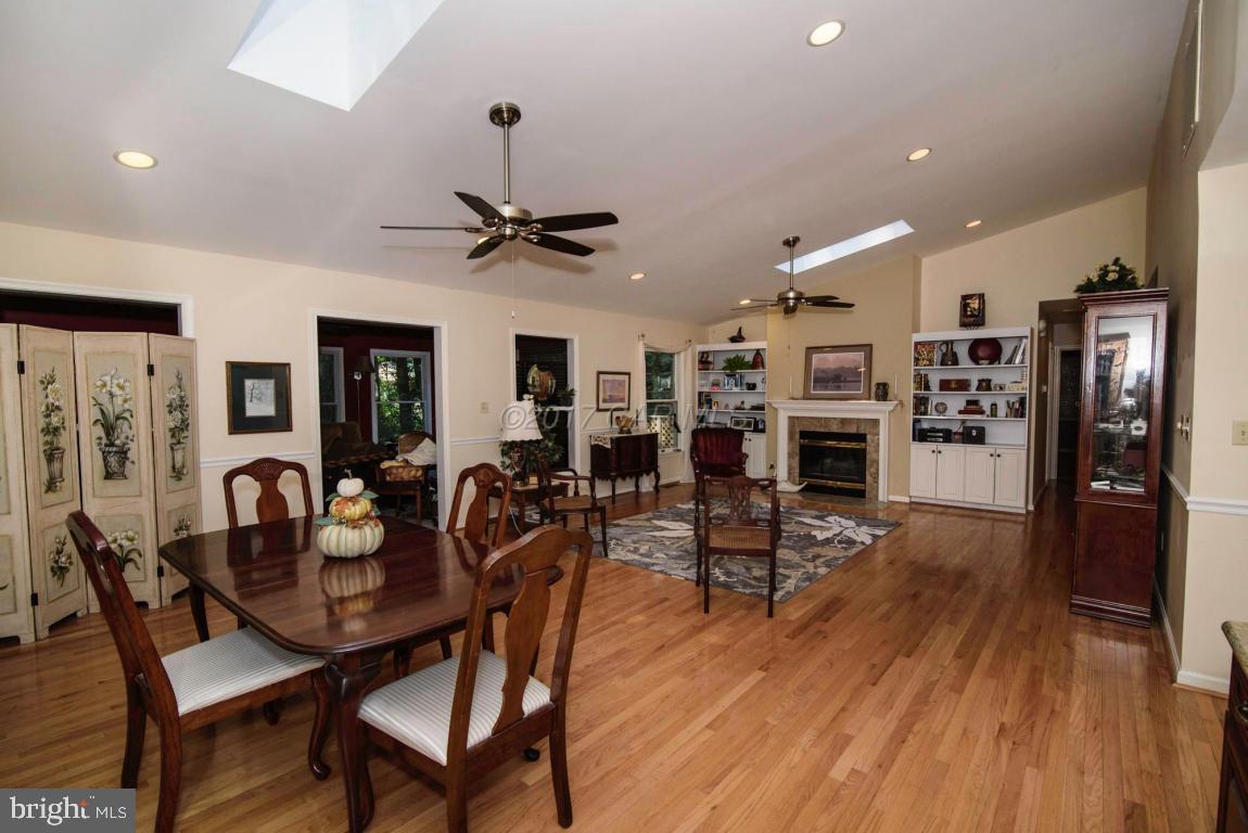 17 Mist Flower Road Ocean Pines, MD 21811 - Photo 18 of 49 a view of a dining room with furniture and wooden floor