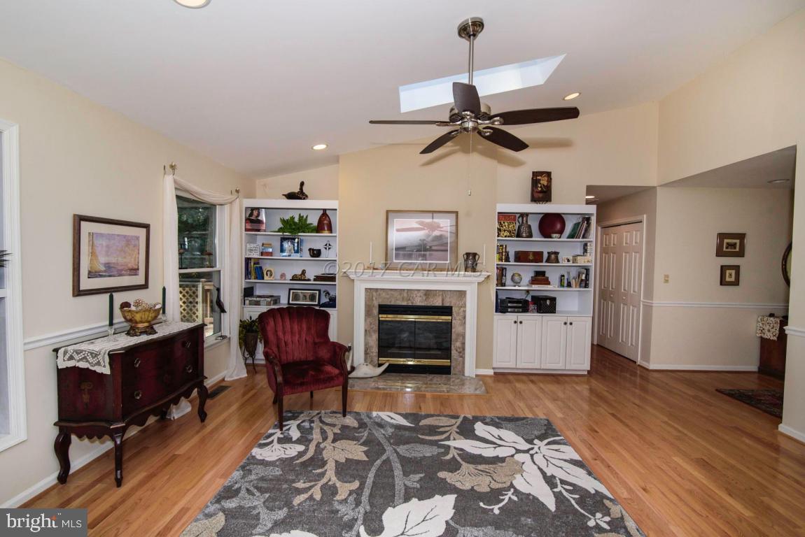 17 Mist Flower Road Ocean Pines, MD 21811 - Photo 19 of 49 a living room with furniture and a fireplace