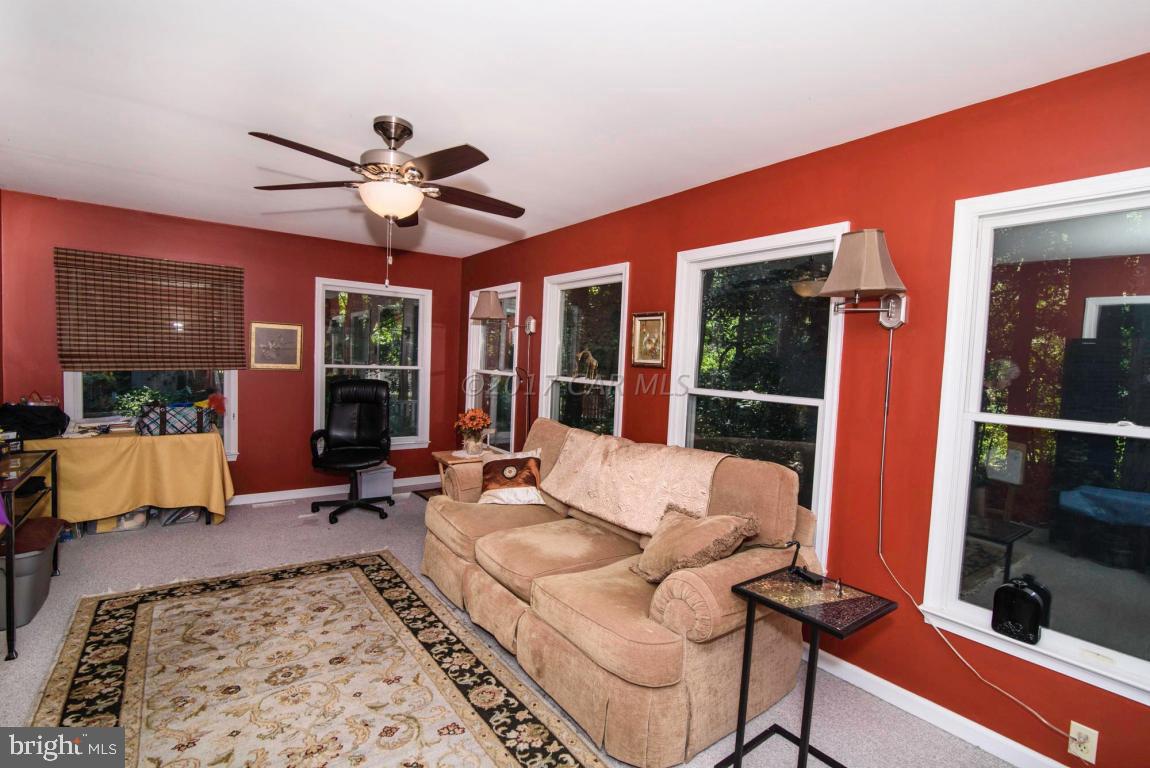 17 Mist Flower Road Ocean Pines, MD 21811 - Photo 23 of 49 a living room with furniture and a large window