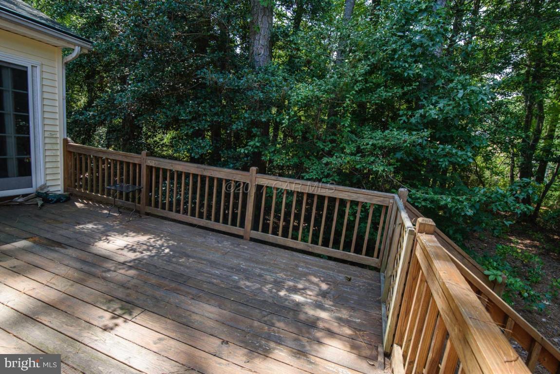 17 Mist Flower Road Ocean Pines, MD 21811 - Photo 26 of 49 a view of balcony with wooden floor and fence
