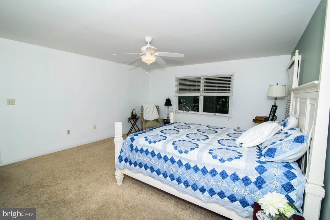 17 Mist Flower Road Ocean Pines, MD 21811 - Photo 29 of 49 a bedroom with bed and window