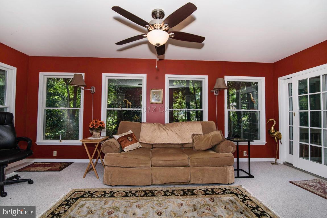 17 Mist Flower Road Ocean Pines, MD 21811 - Photo 5 of 49 a living room with furniture and a large window