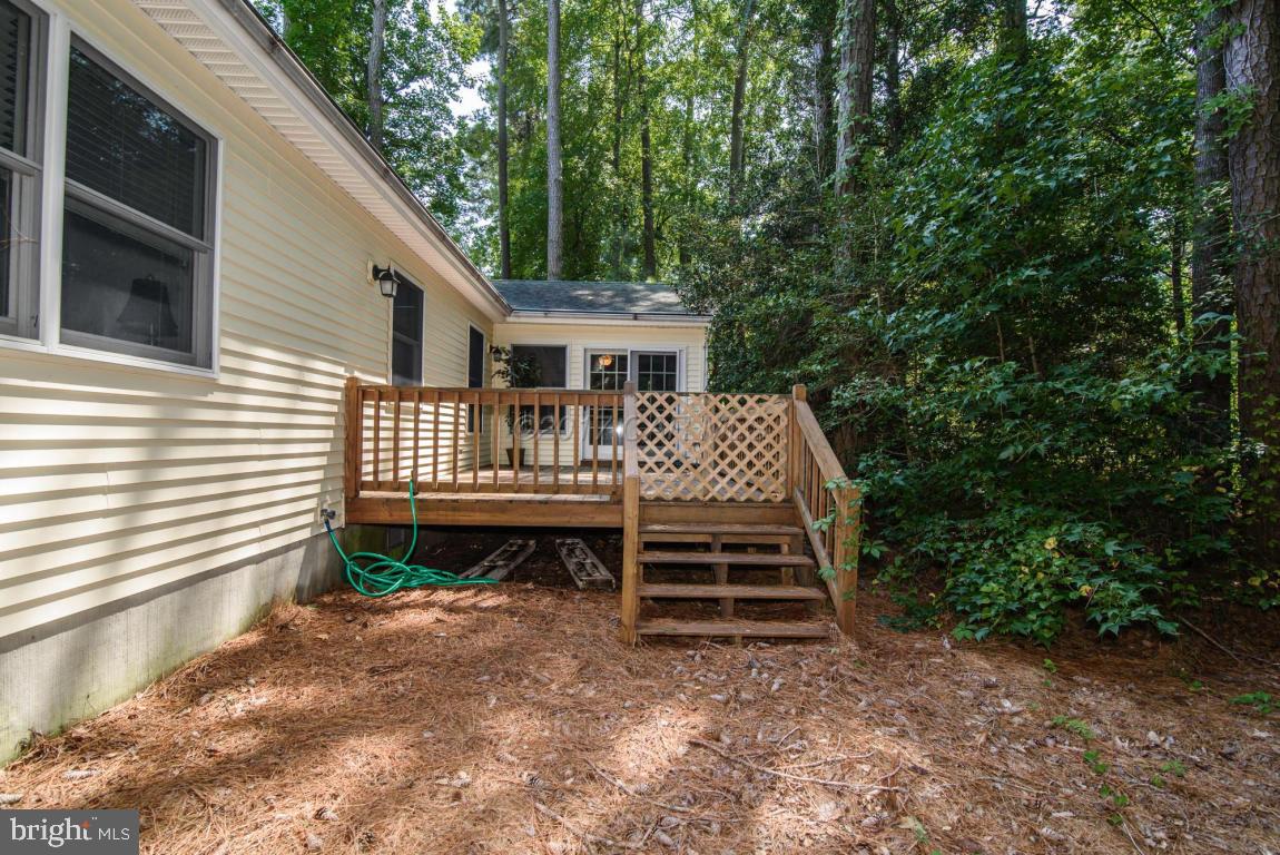 17 Mist Flower Road Ocean Pines, MD 21811 - Photo 45 of 49 a front view of a house with a yard