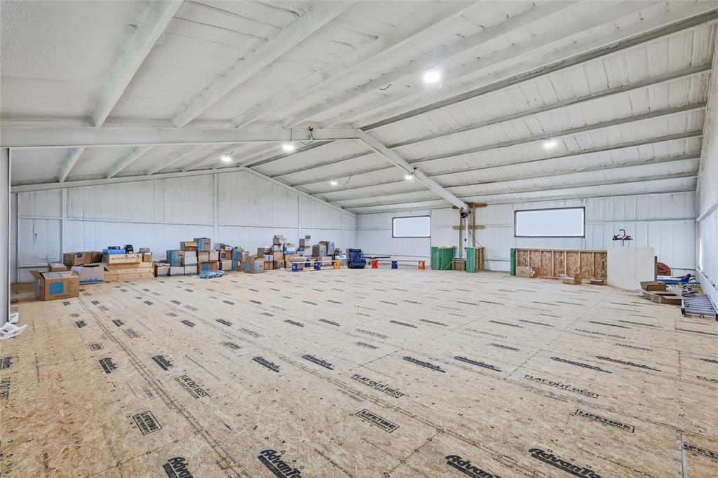 145 ROCK Court Decatur, TX 76234 - Photo 36 of 40 second level of workshop approx. 2500 sq ft with a freight elevator