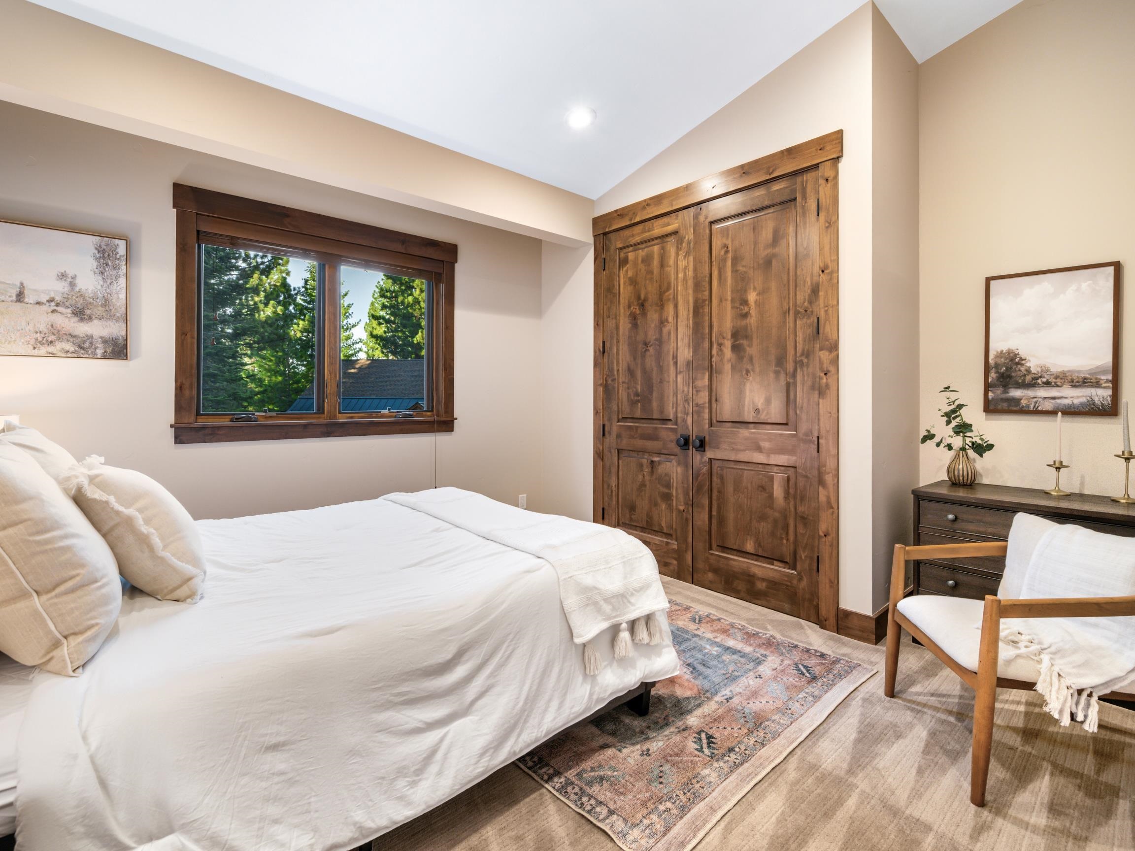 10613 Carson Range Road Truckee, CA 96161 - Photo 15 of 28 a bedroom with a bed and a window