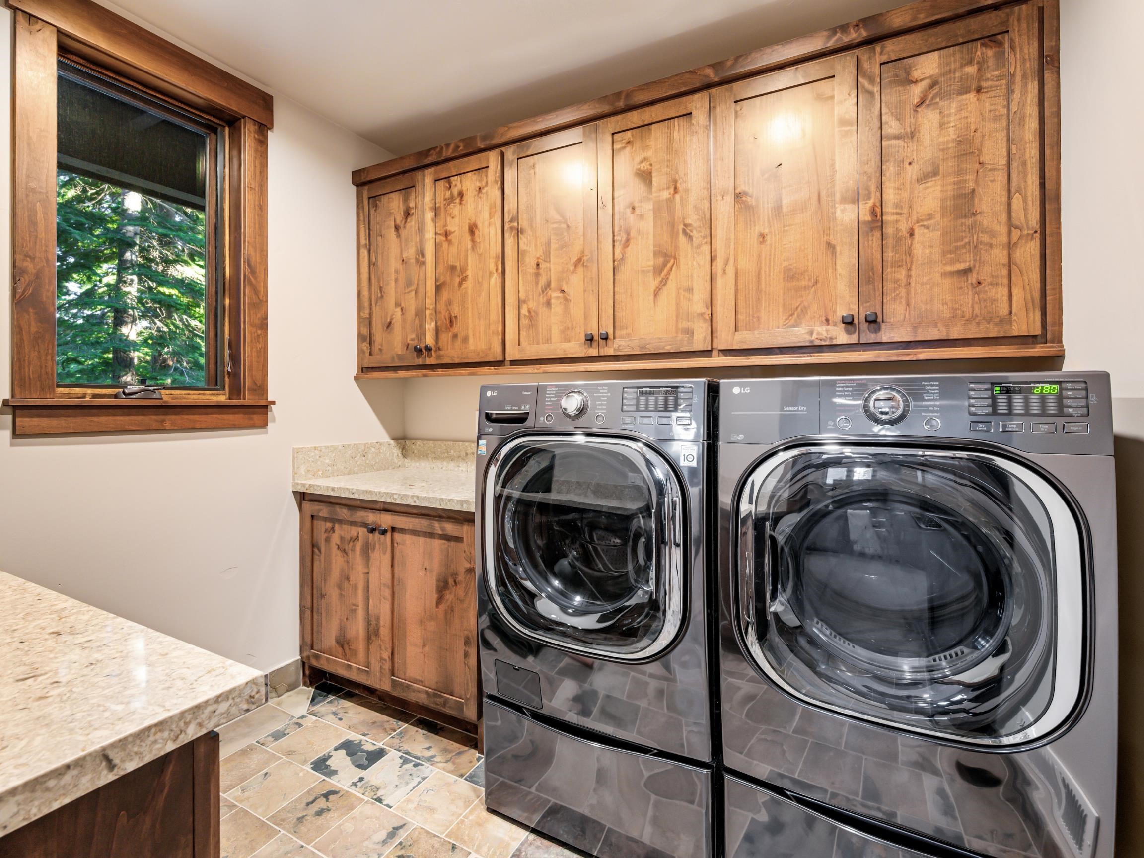 10613 Carson Range Road Truckee, CA 96161 - Photo 20 of 28 a utility room with sink dryer and washer