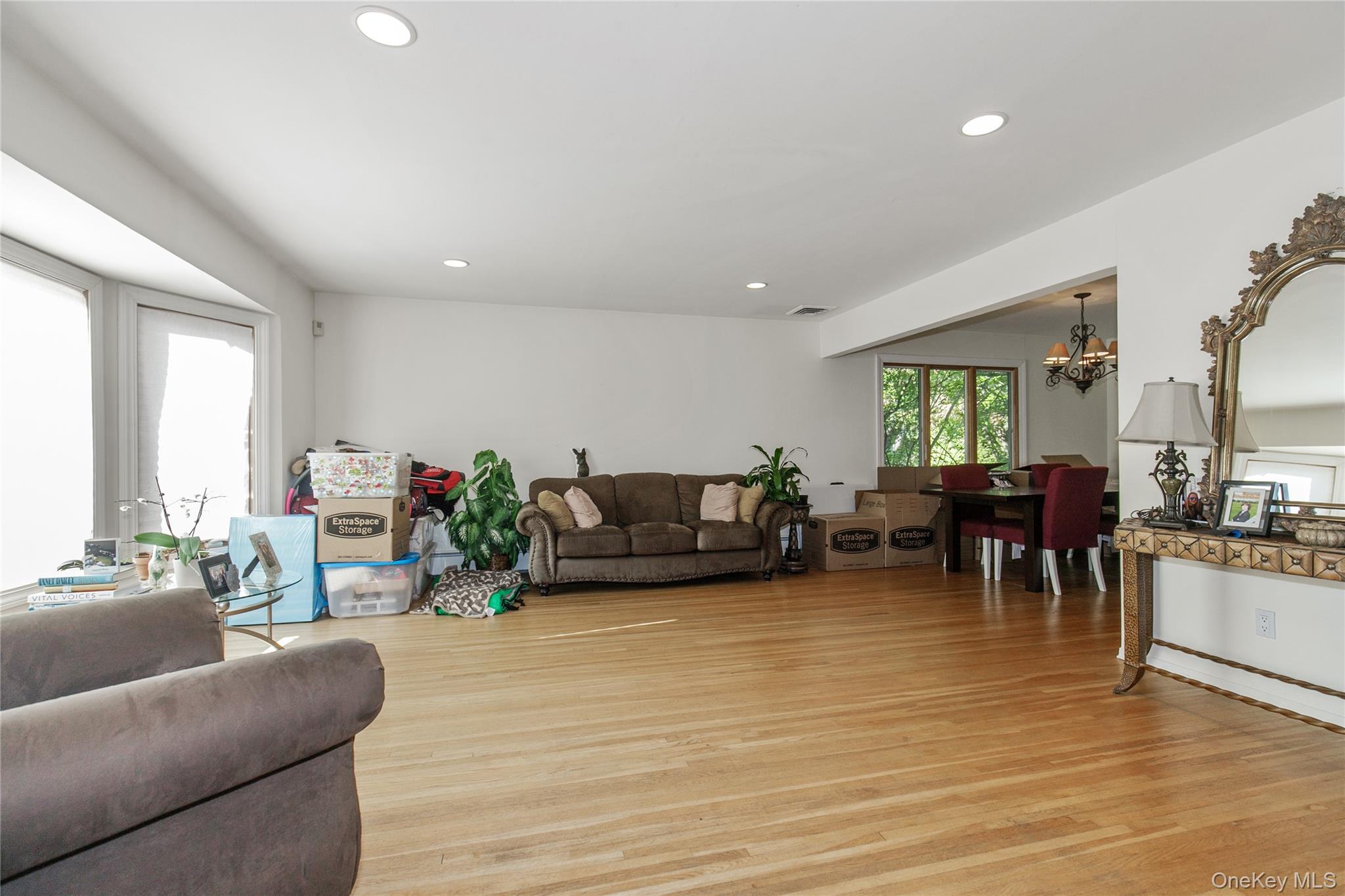 61 Mitchell Avenue Plainview, NY 11803 - Photo 15 of 24 a living room with furniture and a wooden floor