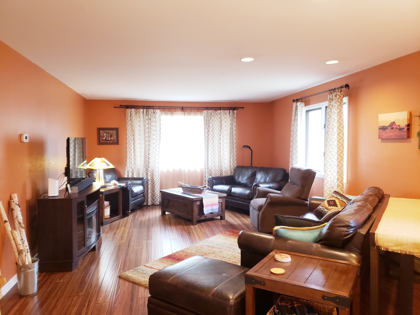 703 South Raven Road Shorewood, IL 60404 - Photo 3 of 8 a living room with furniture fireplace and a large window
