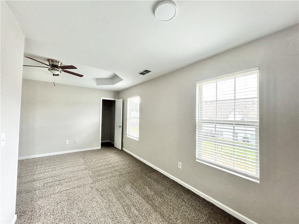 736 Wheel House Lane, Unit B Monroe, GA 30655 - Photo 6 of 15 a view of an empty room with a window
