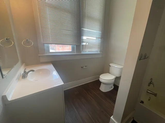 a bathroom with a sink and a toilet