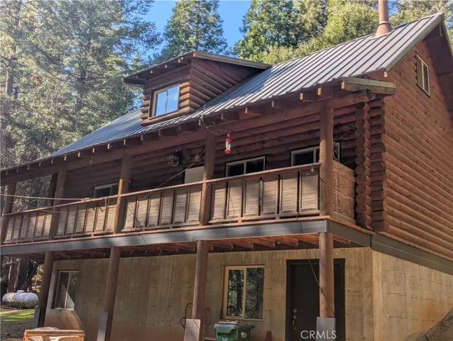a front view of a house with balcony