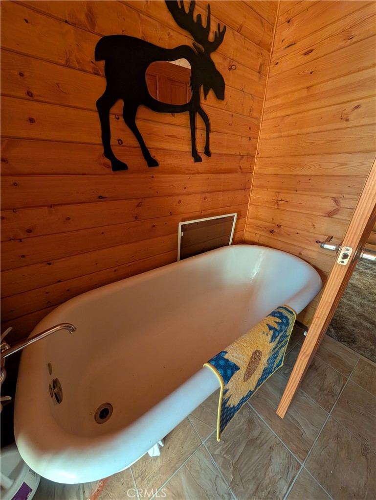 4715 Peregrine Road Forest Ranch, CA 95942 - Photo 8 of 13 a blue bench sitting in a bathroom