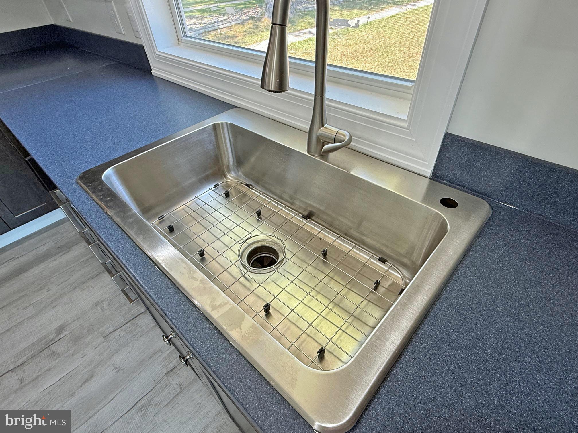 33308 Lighthouse Court, Unit D18 Lewes, DE 19958 - Photo 12 of 39 a close up of a sink