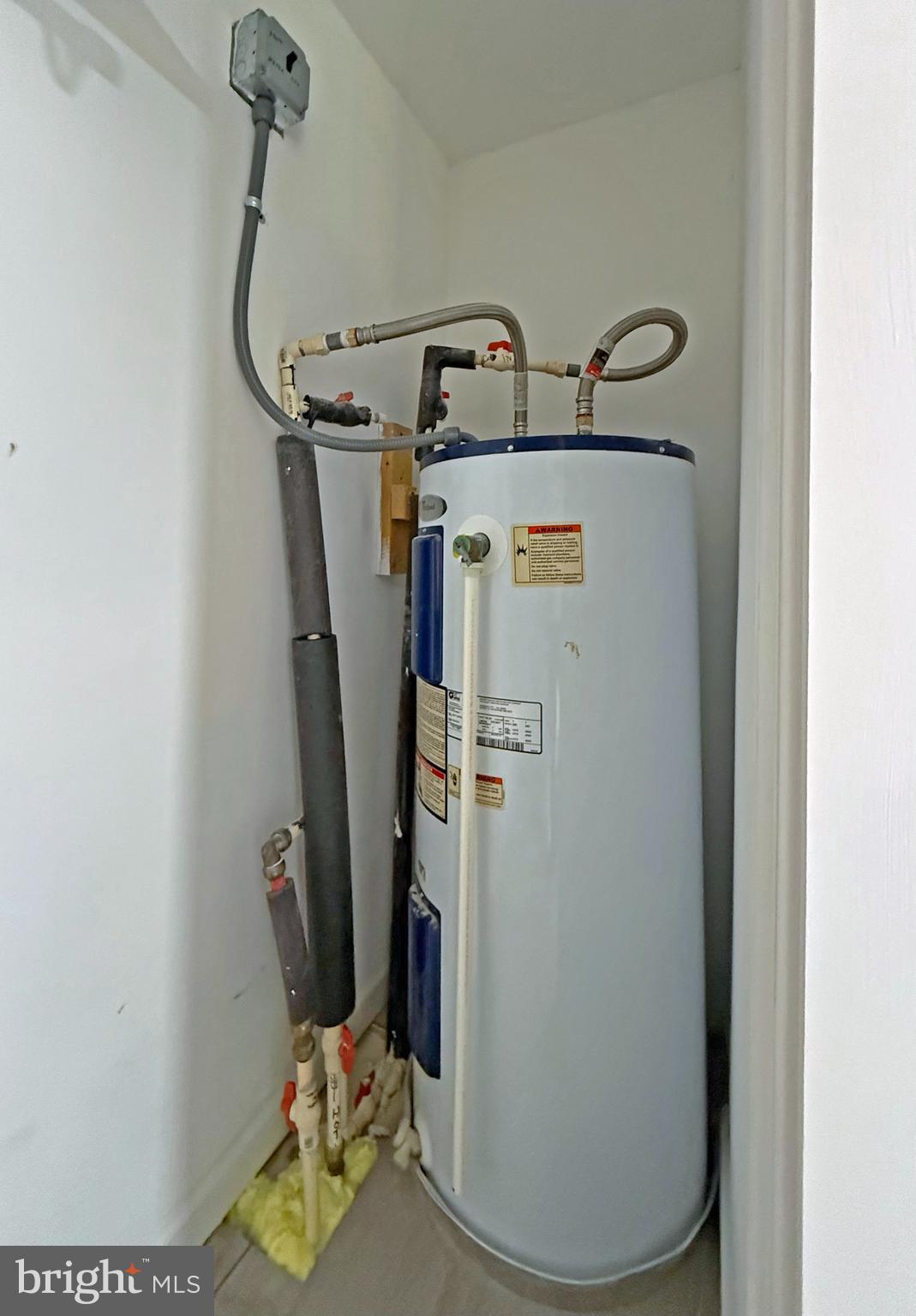 33308 Lighthouse Court, Unit D18 Lewes, DE 19958 - Photo 16 of 39 a view of water heater room