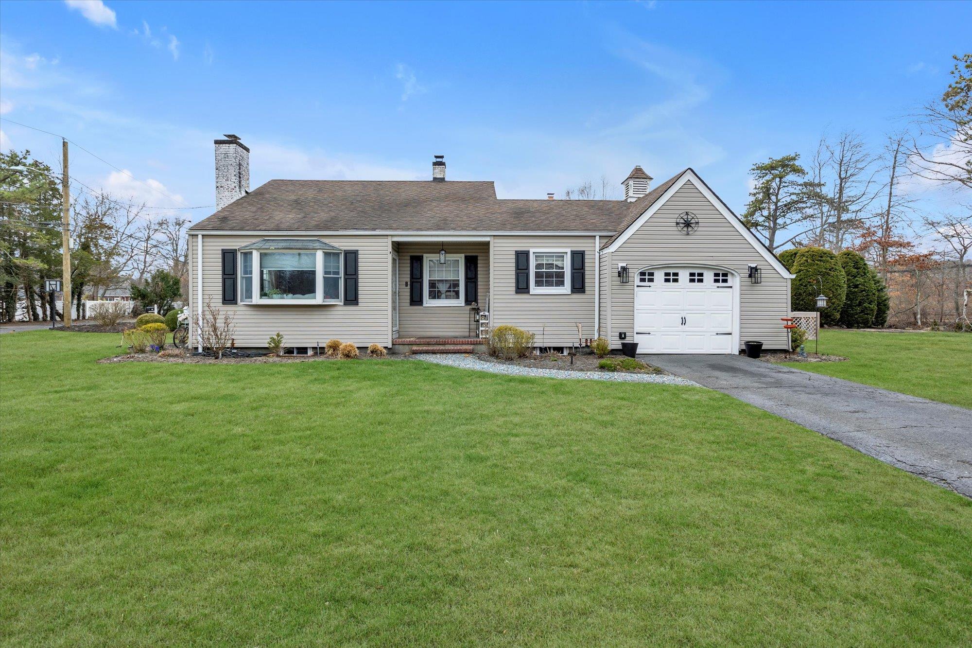 6 Brookway Oakdale, NY 11769 - Photo 1 of 1 a front view of house with yard and green space