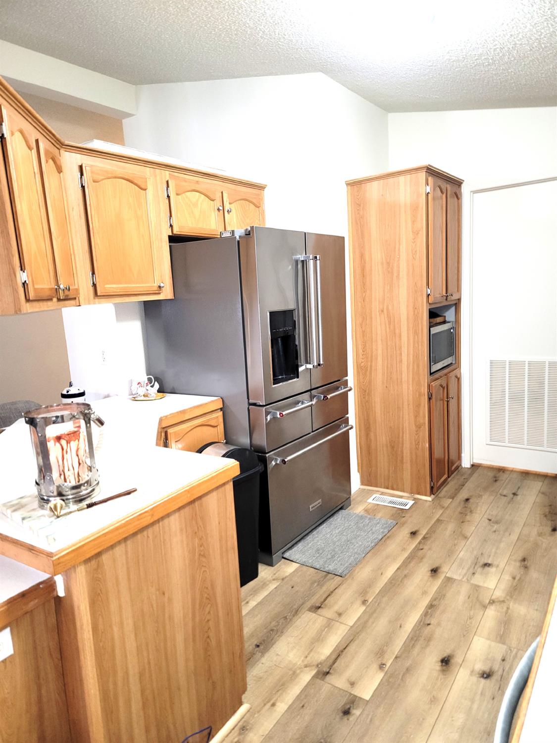 3550 China Garden Road, Unit 59 Placerville, CA 95667 - Photo 11 of 18 a kitchen with a refrigerator and a sink