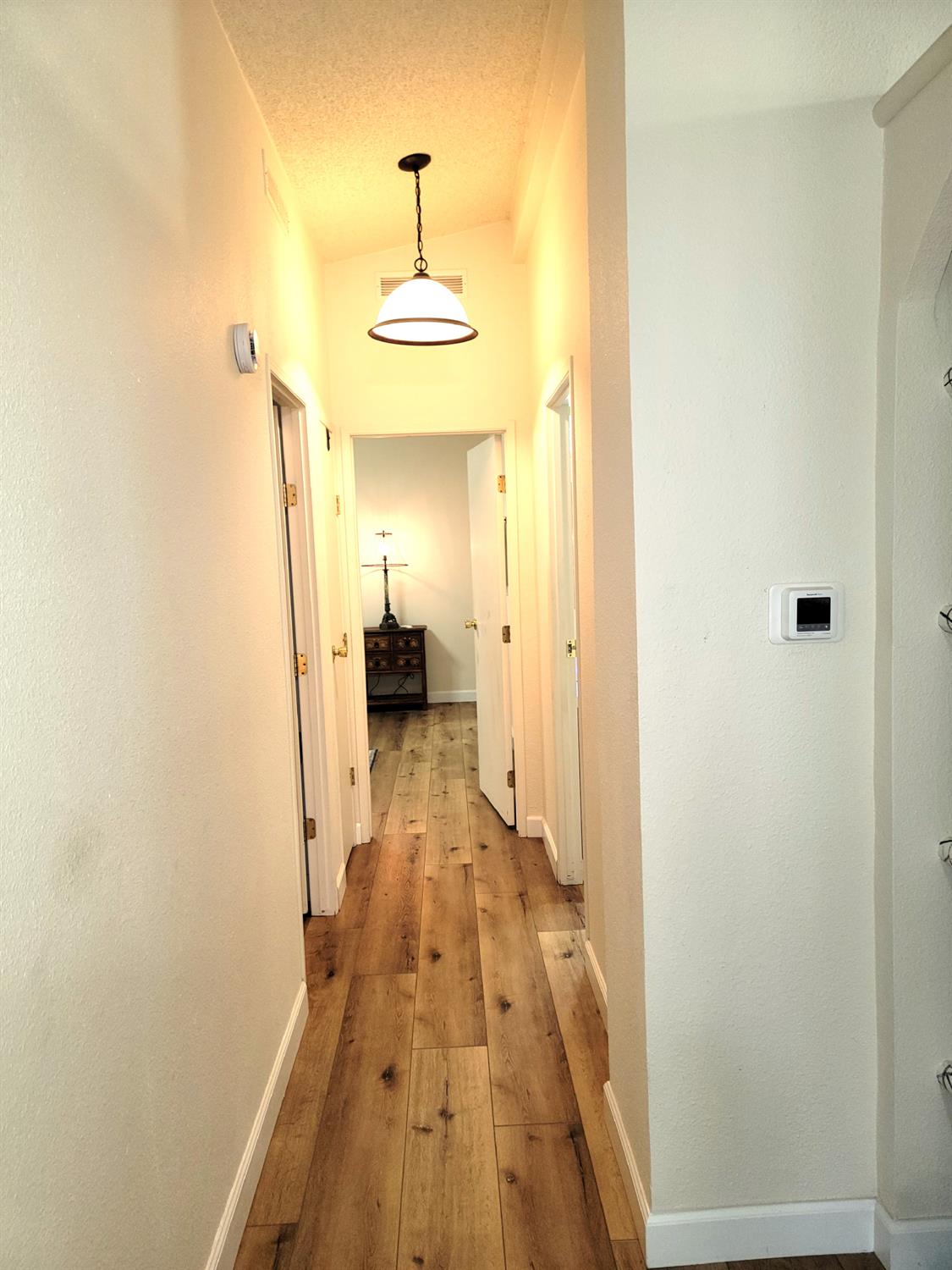 3550 China Garden Road, Unit 59 Placerville, CA 95667 - Photo 13 of 18 a view of hallway with wooden floor