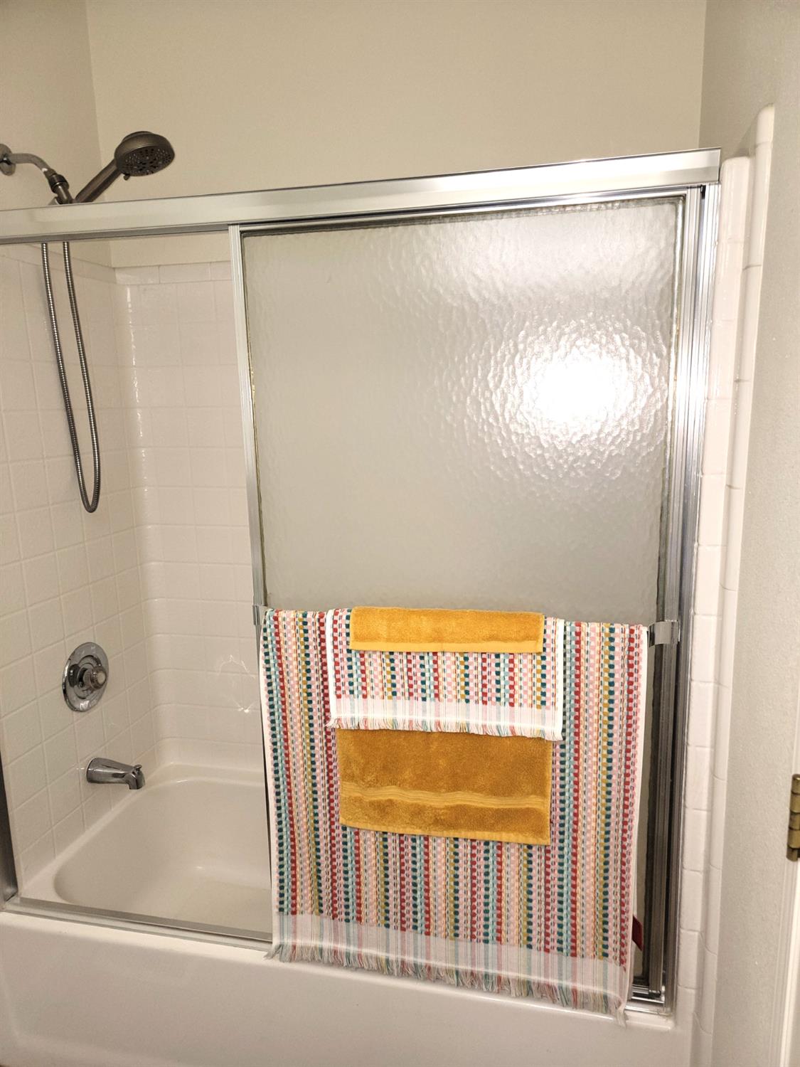 3550 China Garden Road, Unit 59 Placerville, CA 95667 - Photo 16 of 18 a bathroom with a shower and a bath tub