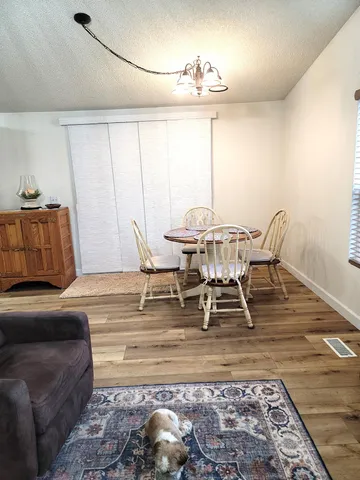 a living room with furniture and window