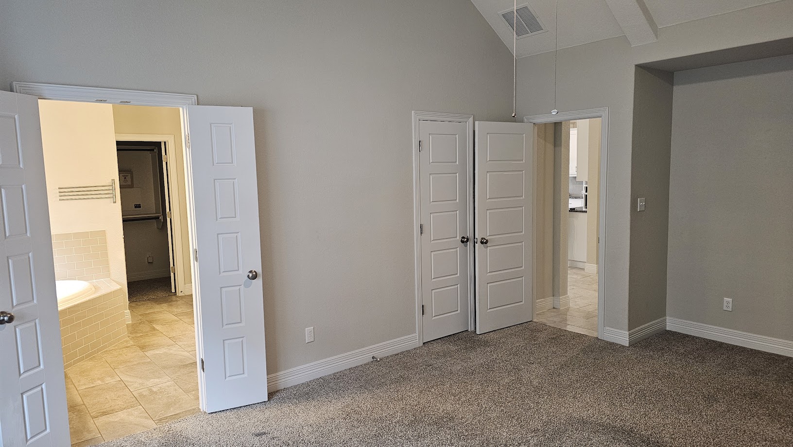712 Muster Bend Georgetown, TX 78626 - Photo 10 of 26 Unfurnished bedroom featuring baseboards, visible vents, and light colored carpet