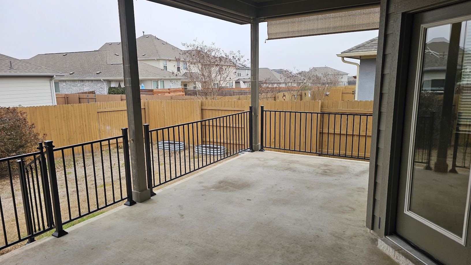 712 Muster Bend Georgetown, TX 78626 - Photo 5 of 26 View of patio with a residential view and fence