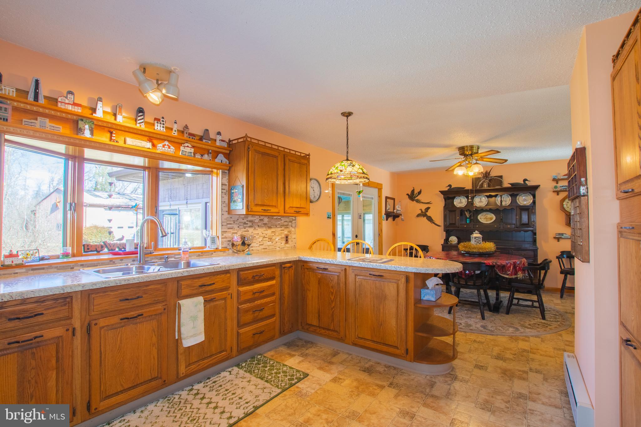 274 Robinson Road Salem, NJ 08079 - Photo 14 of 37 a large kitchen with a sink and cabinets