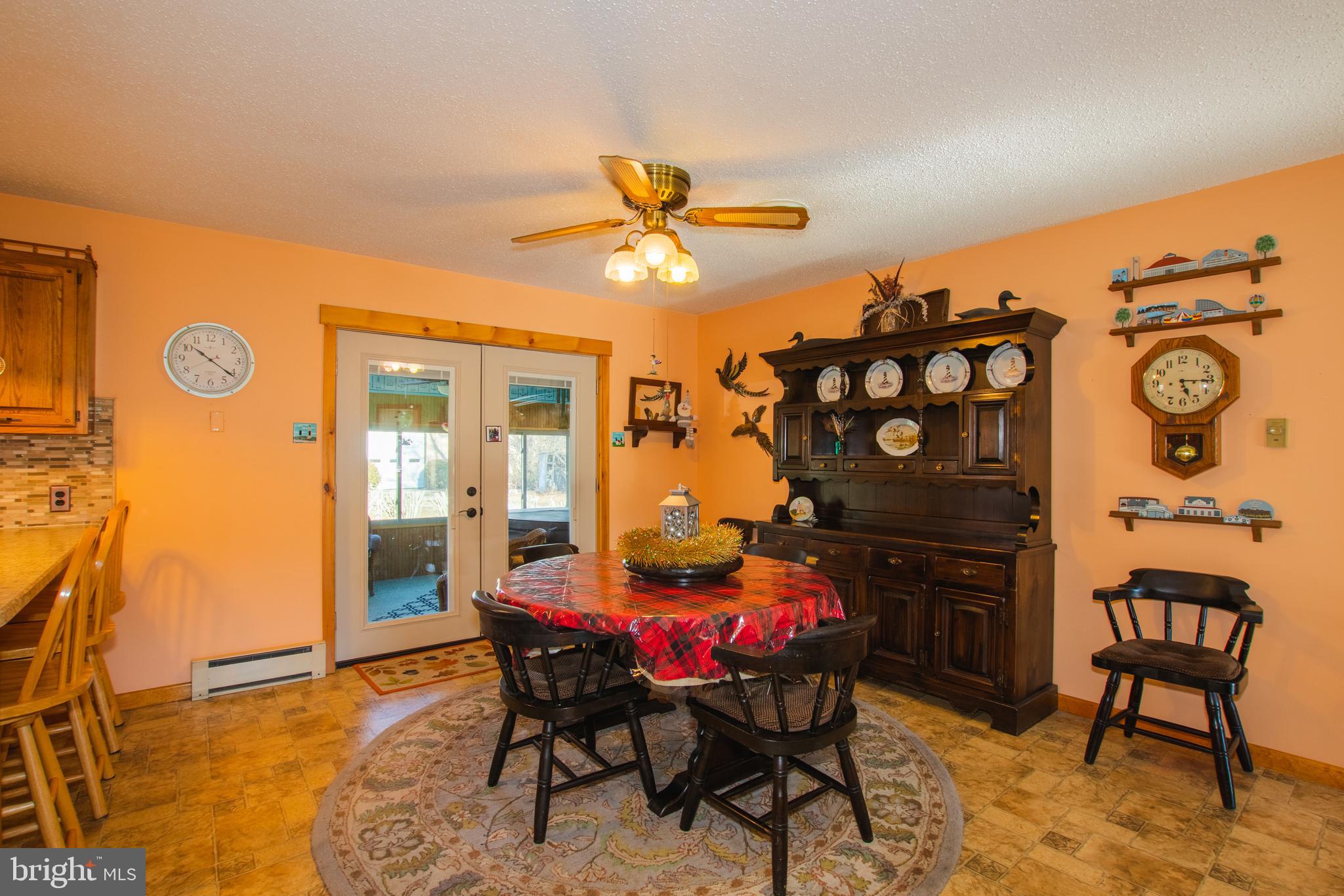 274 Robinson Road Salem, NJ 08079 - Photo 17 of 37 a dining room with furniture and wooden floor
