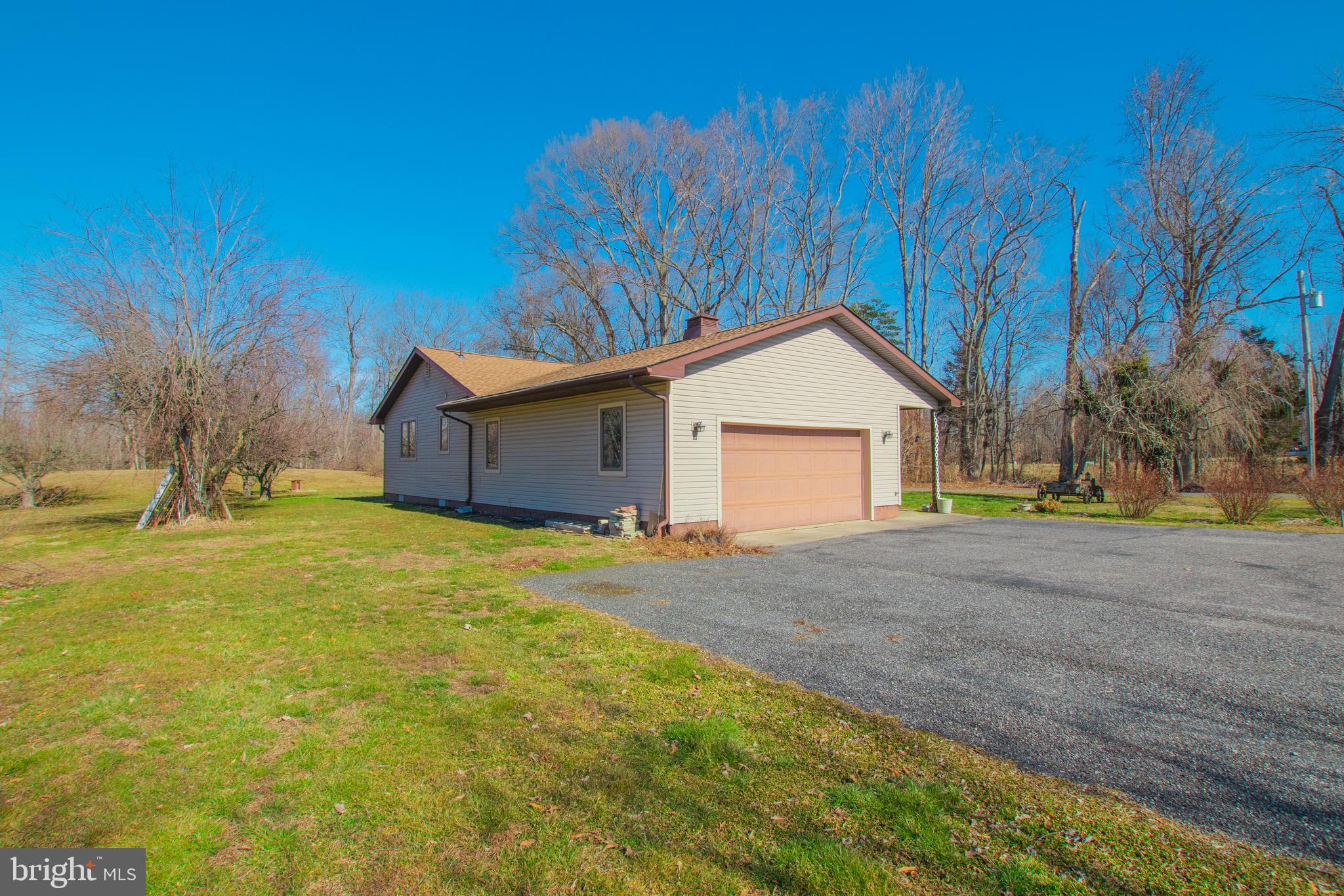 274 Robinson Road Salem, NJ 08079 - Photo 3 of 37 a view of a house with a yard and garage