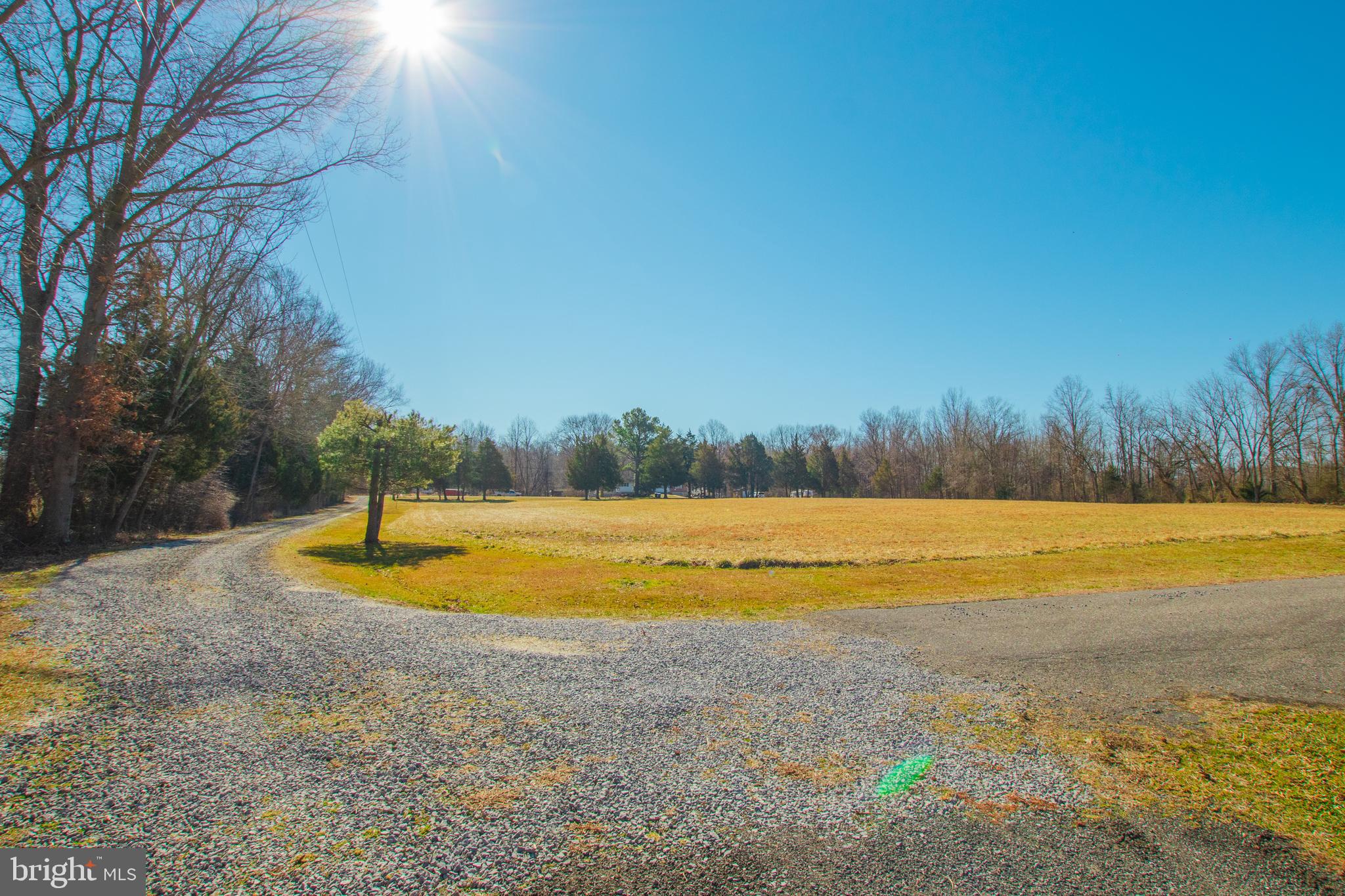 274 Robinson Road Salem, NJ 08079 - Photo 5 of 37 a view of a swimming pool with an outdoor space and seating area