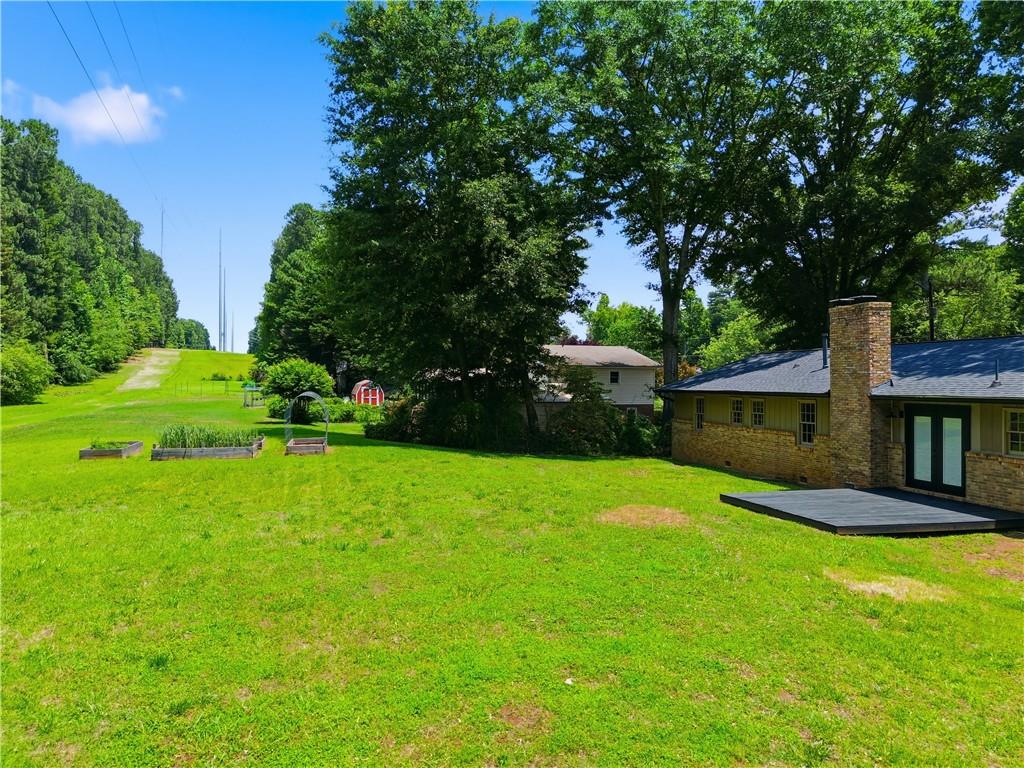125 Childers Road Canton, GA 30115 - Photo 43 of 48 a view of a backyard of the house