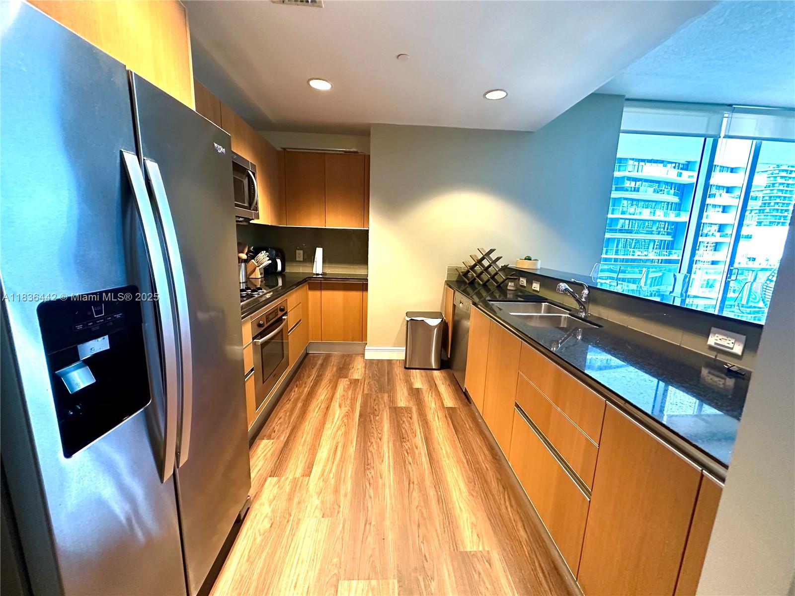 1050 Brickell Avenue, Unit 2220 Miami, FL 33131 - Photo 4 of 20 a view of a living room with furniture