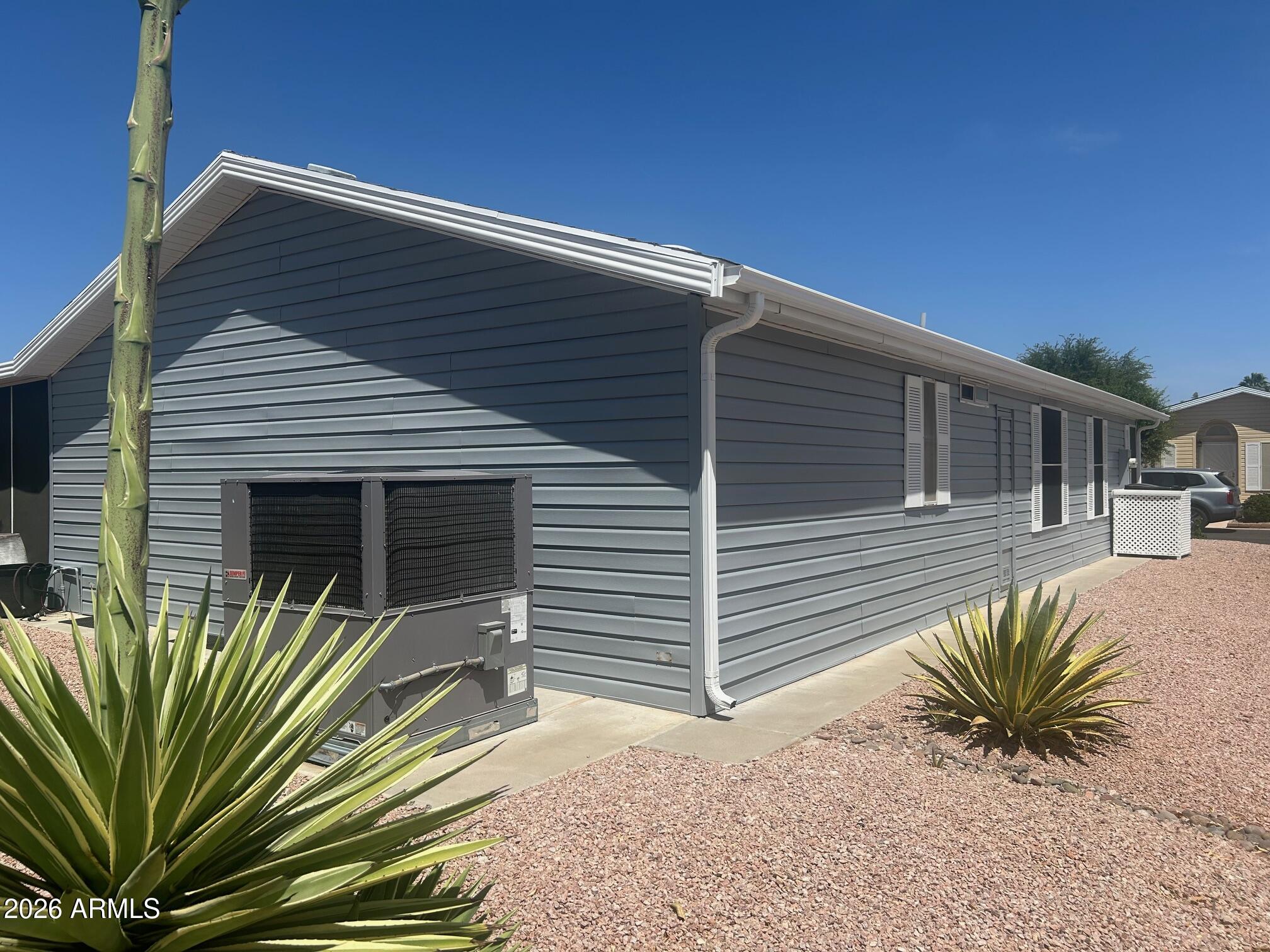 2550 South Ellsworth Road, Unit 46 Mesa, AZ 85209 - Photo 30 of 46 a view of front door and potted plants